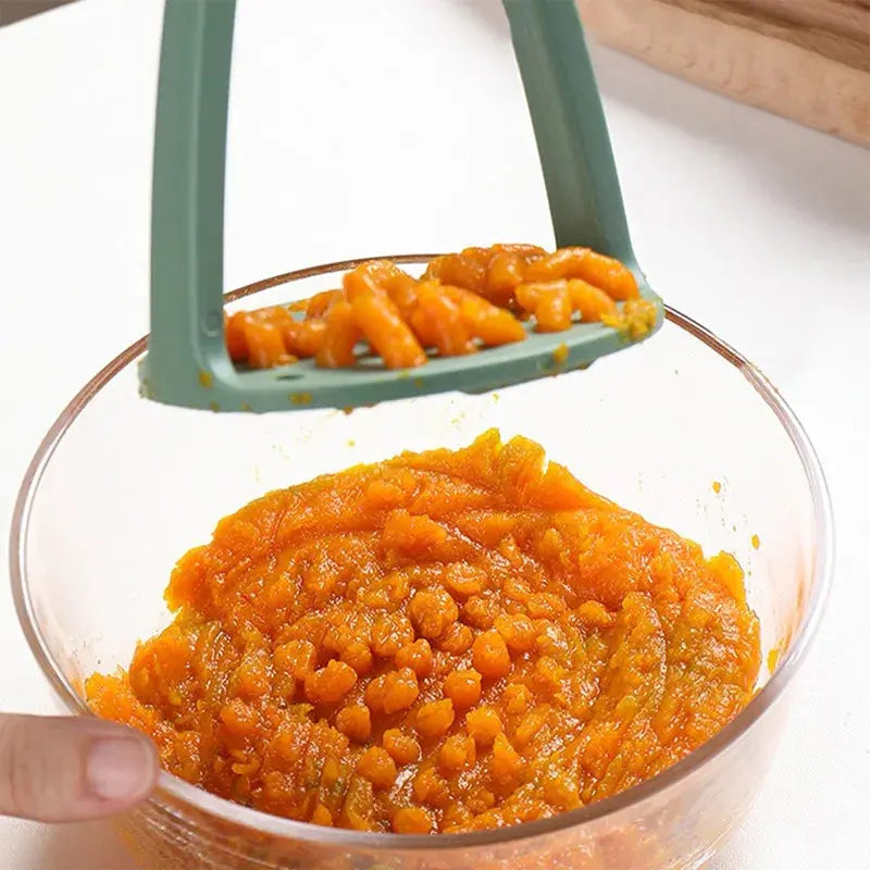Presse purée ergonomique carottes